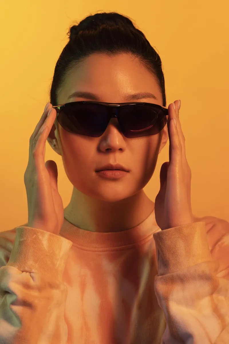 Opticien-OeildeBisch-Bischoffsheim-Obernai-Lunettes-Soleil Femme portant des lunettes de soleil